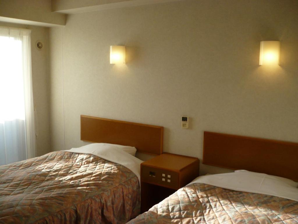 Hotel New Budget Muroran Rum bild
